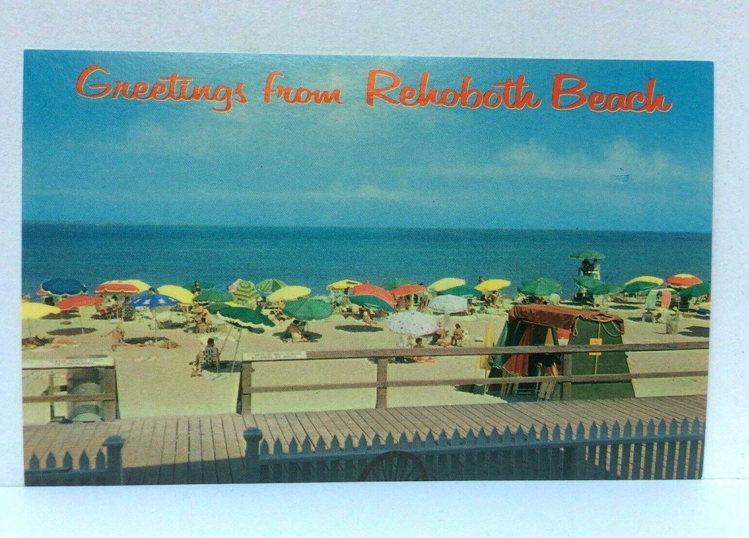 Rehoboth Beach Delaware Relaxing At Beach Umbrellas Postcard